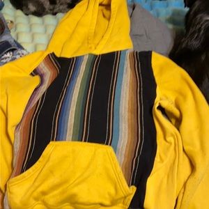 Gently used yellow and serape hoodie.